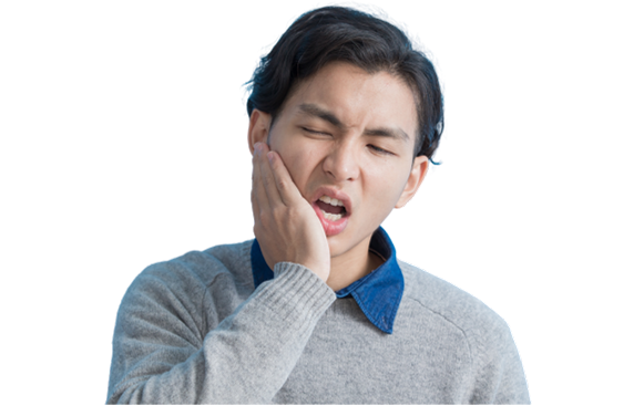 歯が痛む男性